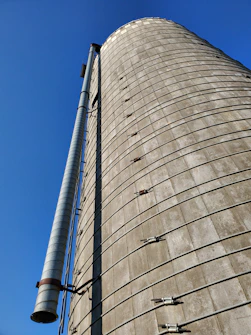 a tall building with a sky background