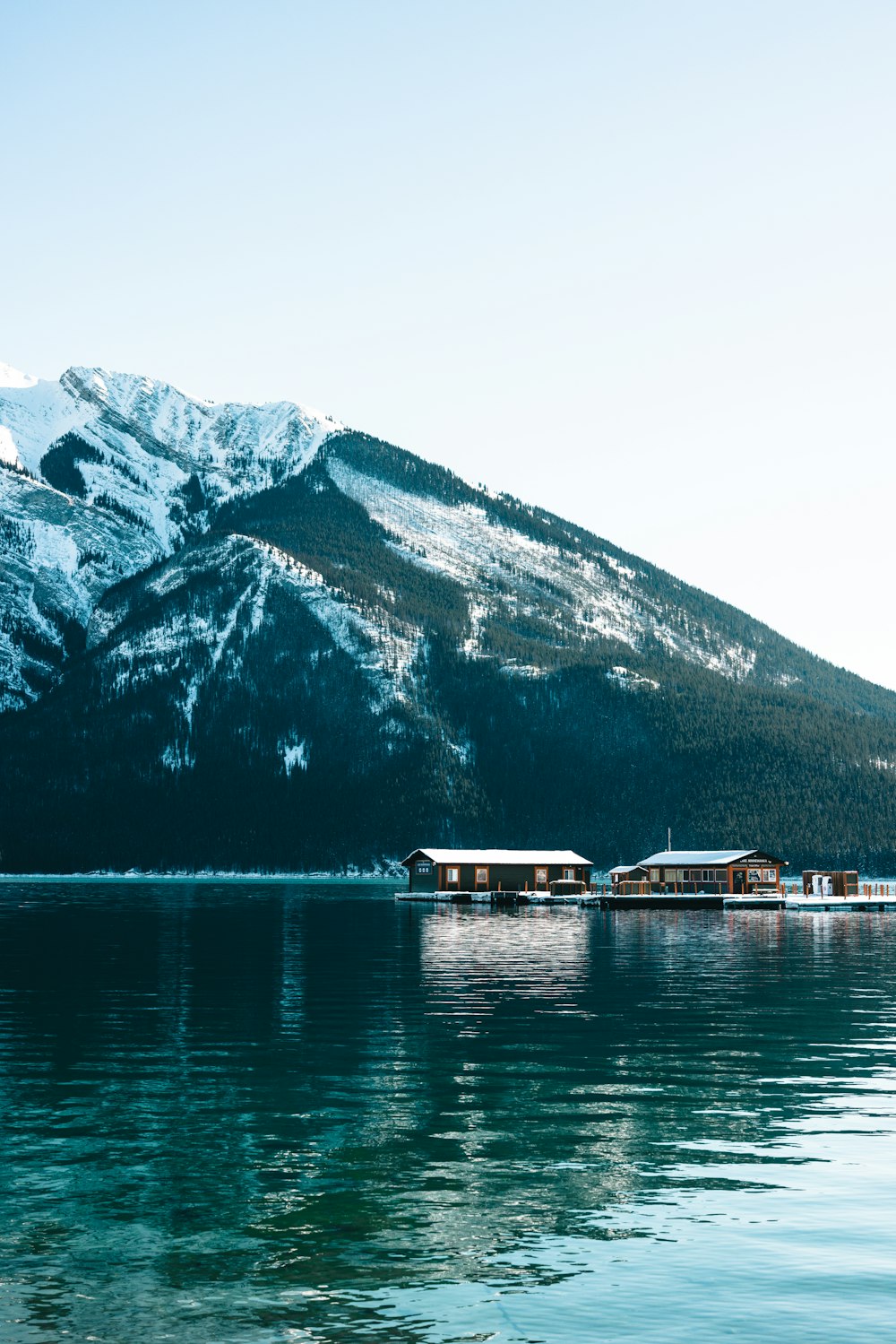 a lake with a mountain in the background