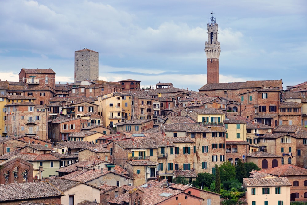 a city with lots of tall buildings and a clock tower