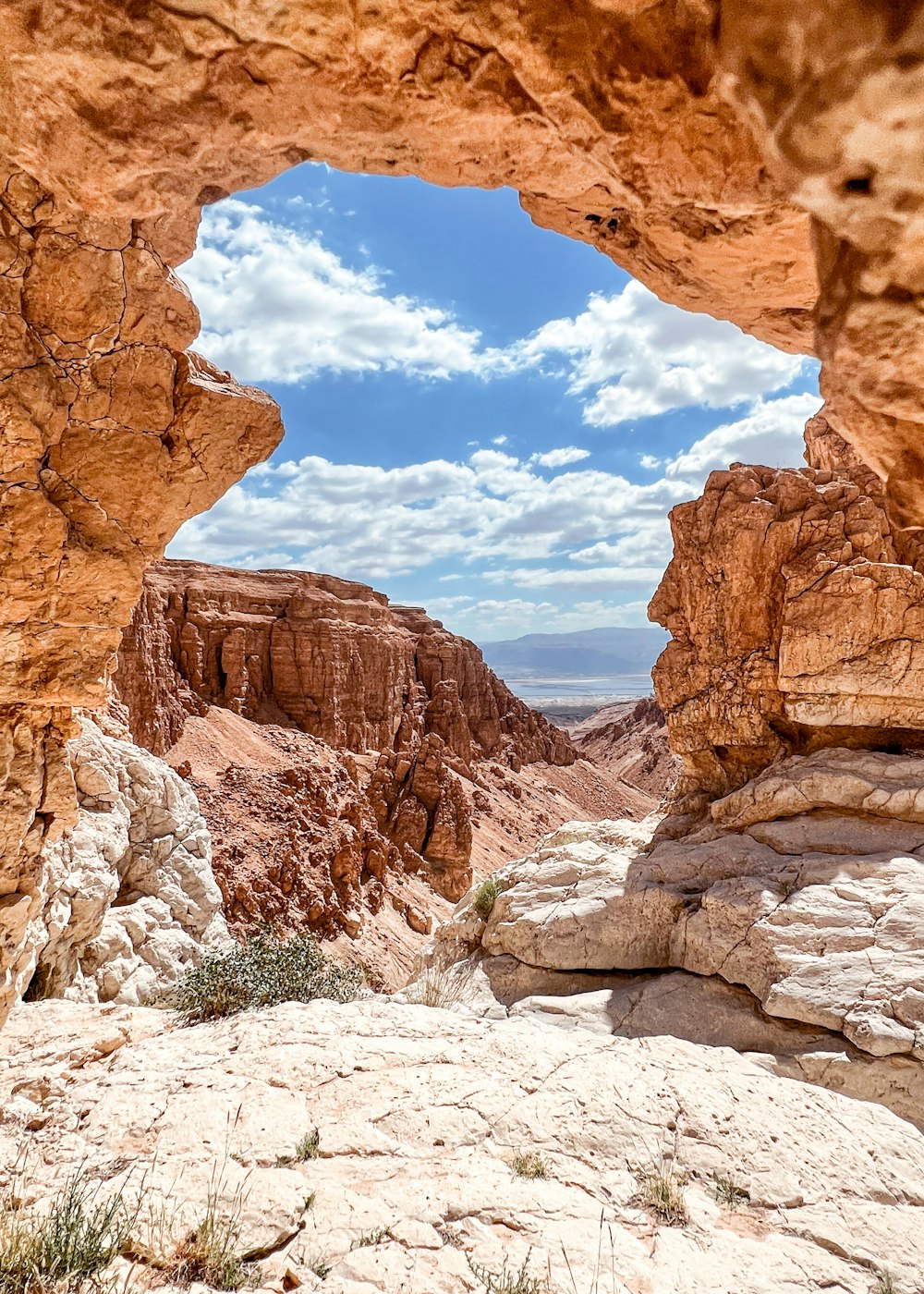 a rocky landscape with a hole in the middle