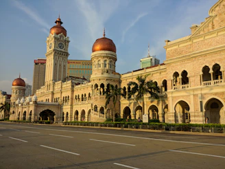 a large building with a clock on the top of it