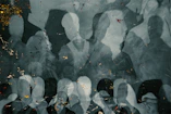 a group of people standing next to each other