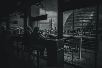 A quiet Lithuanian café where locals engage in thoughtful conversation over coffee.