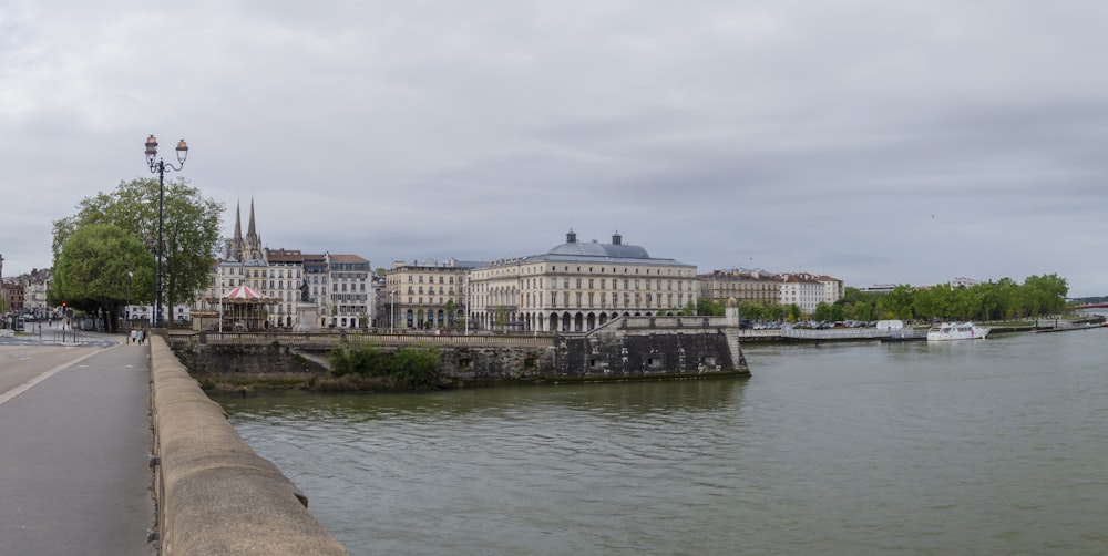 a large body of water next to a city