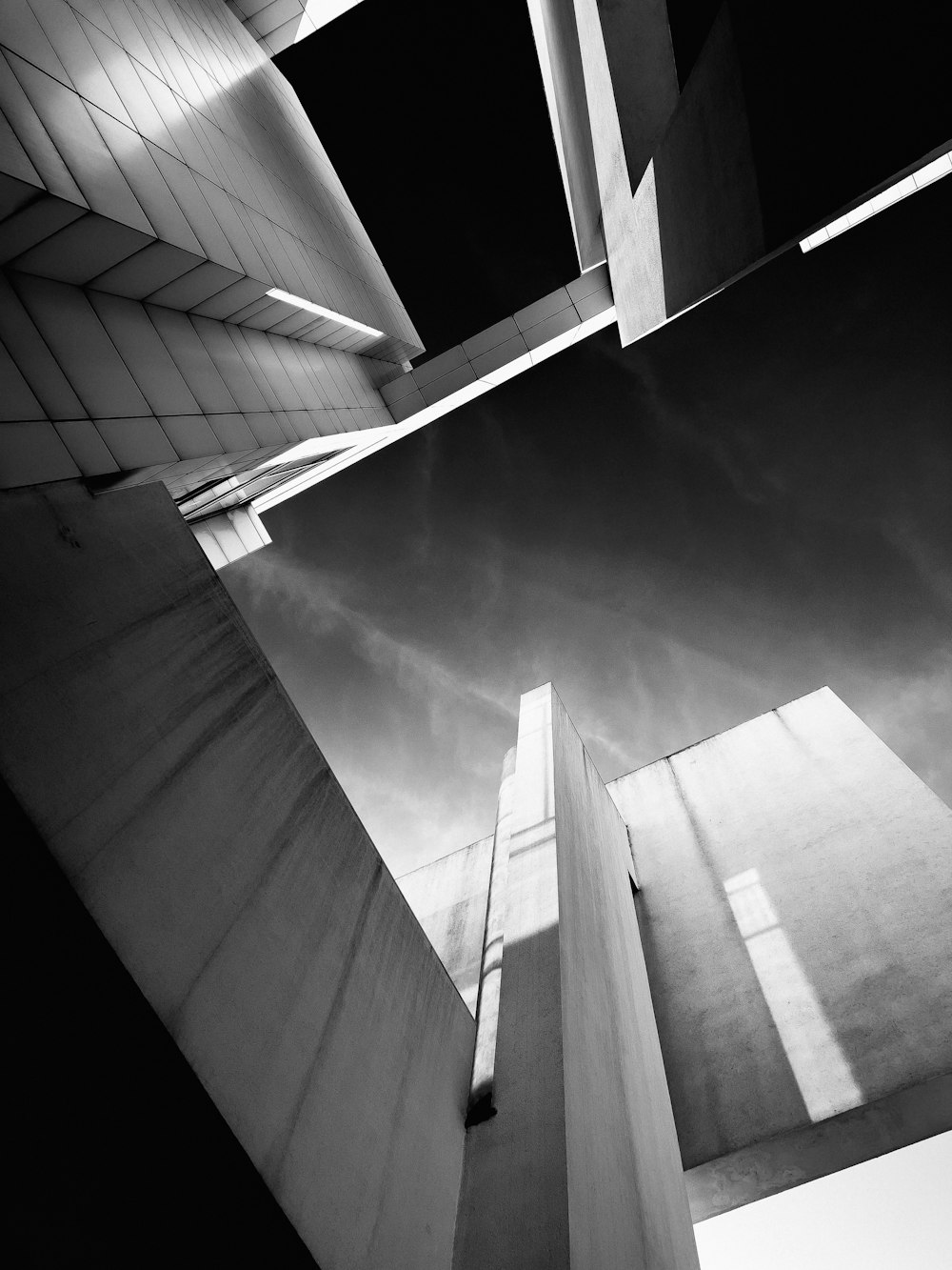 a black and white photo of a tall building