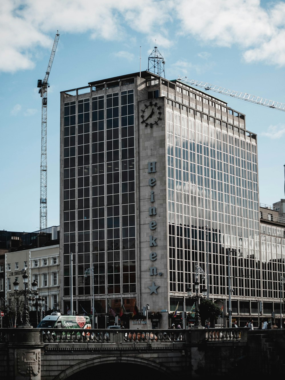 a tall building with a clock on the side of it