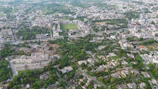 Aerial view of an urban planning layout with roads and green spaces integrated.