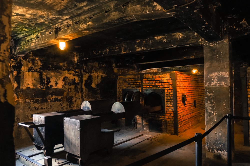 a room with a brick wall and two sinks