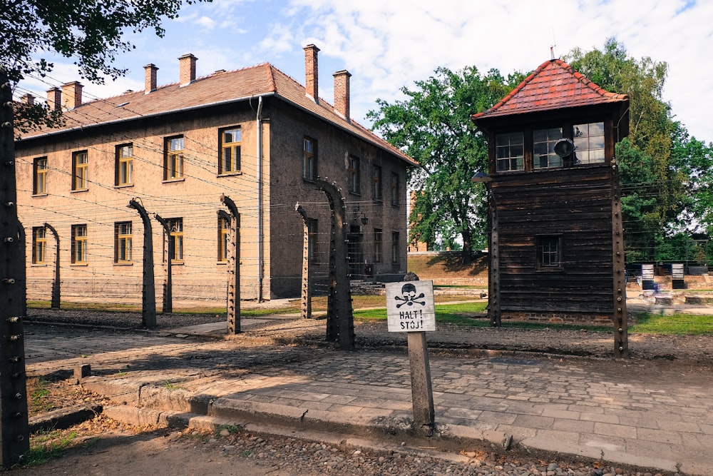 an old building with a sign in front of it