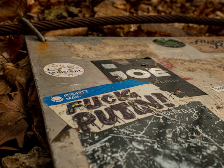 A rugged outdoor label on construction equipment, withstanding rain and dirt.