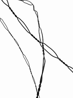 Before and after images of a wire cleanup project.