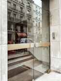 Wide shot of a luxury apartment entrance featuring Casa Cueva’s smart lock technology.