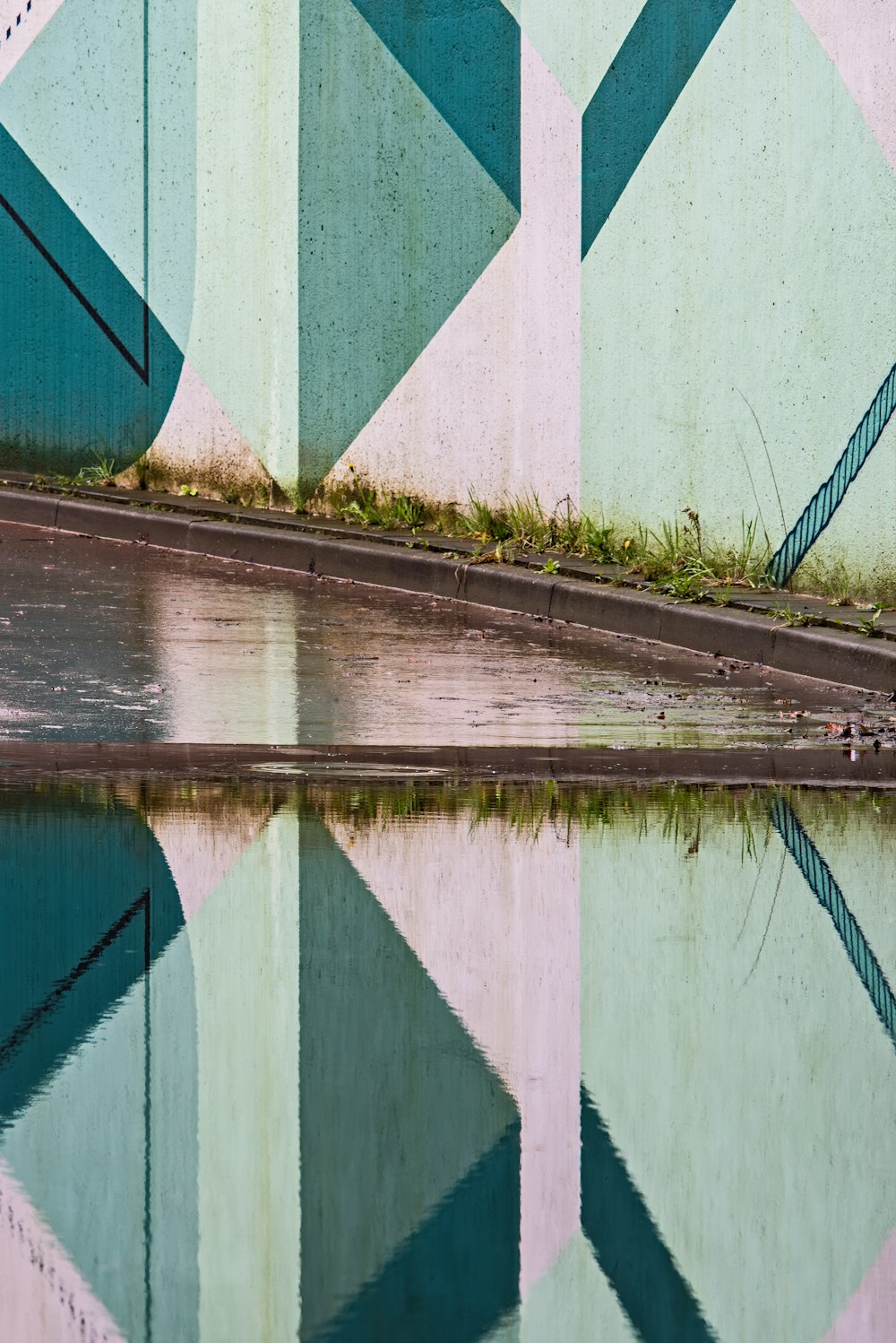 a reflection of a building in the water