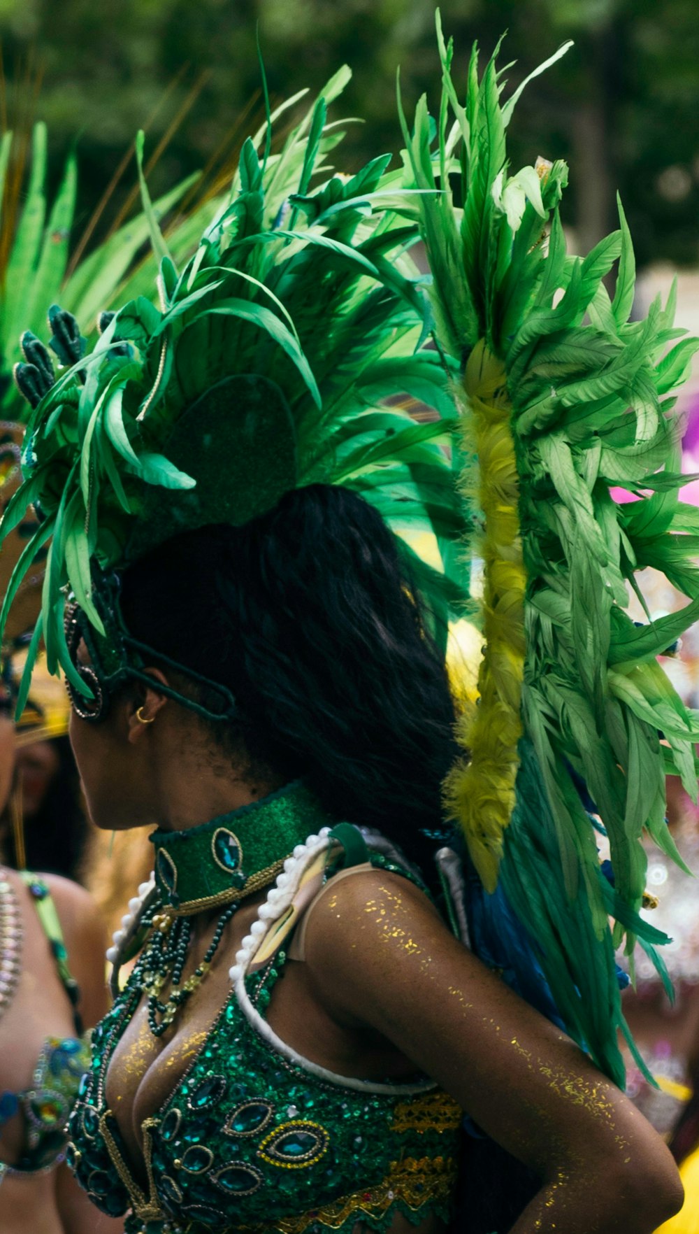 a woman in a green and yellow costume