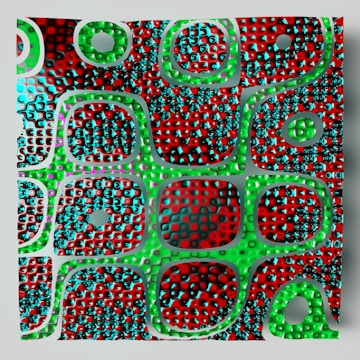 A vibrant and abstract 3D pattern features a grid-like arrangement with a mix of circular and square shapes. The design has a textured surface with red and green hues dominating, interspersed with black and turquoise details, giving a sense of depth and complexity.
