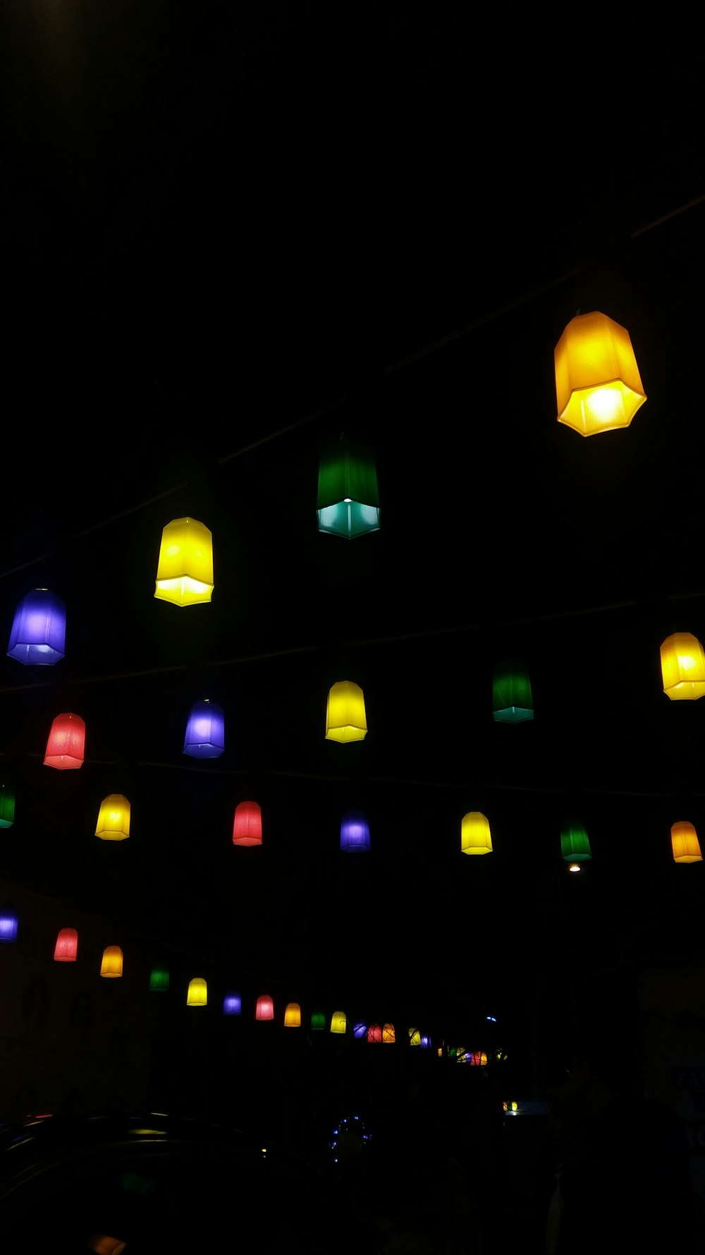 a bunch of lights that are on a wire