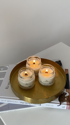 A serene workspace with spiritual books and candles symbolizing trust and healing.