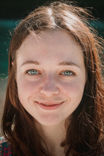 a close up of a person with blue eyes