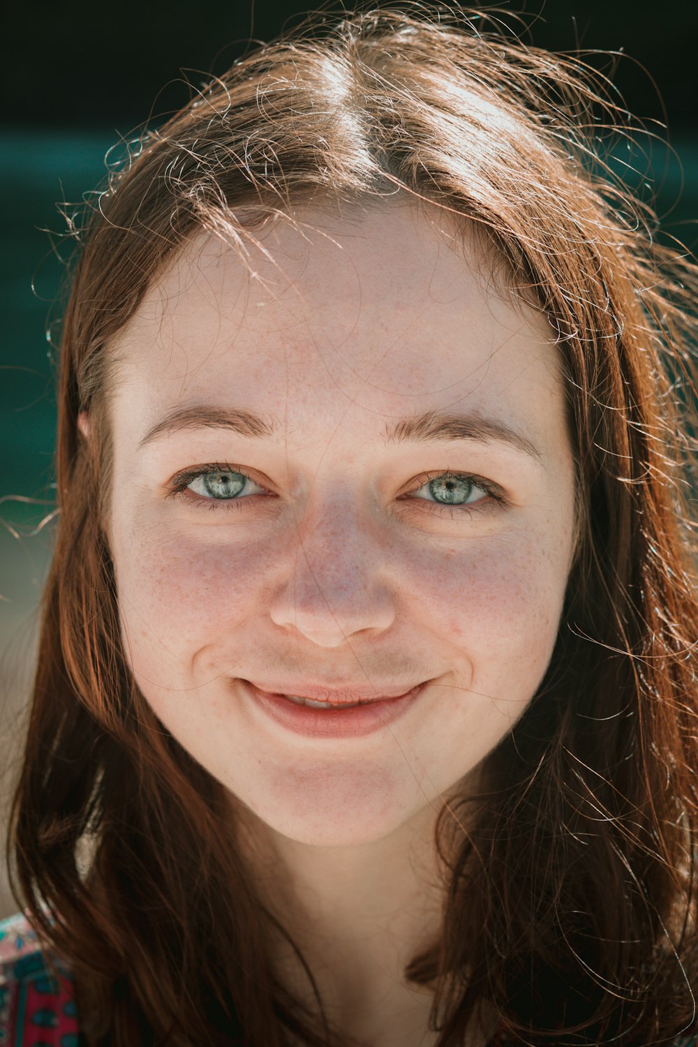 a close up of a person with blue eyes