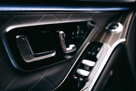 An interior shot of a car with gleaming surfaces and clean upholstery.