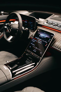 Luxury vehicle mobile ecosystem sync and driver assistance calibration.