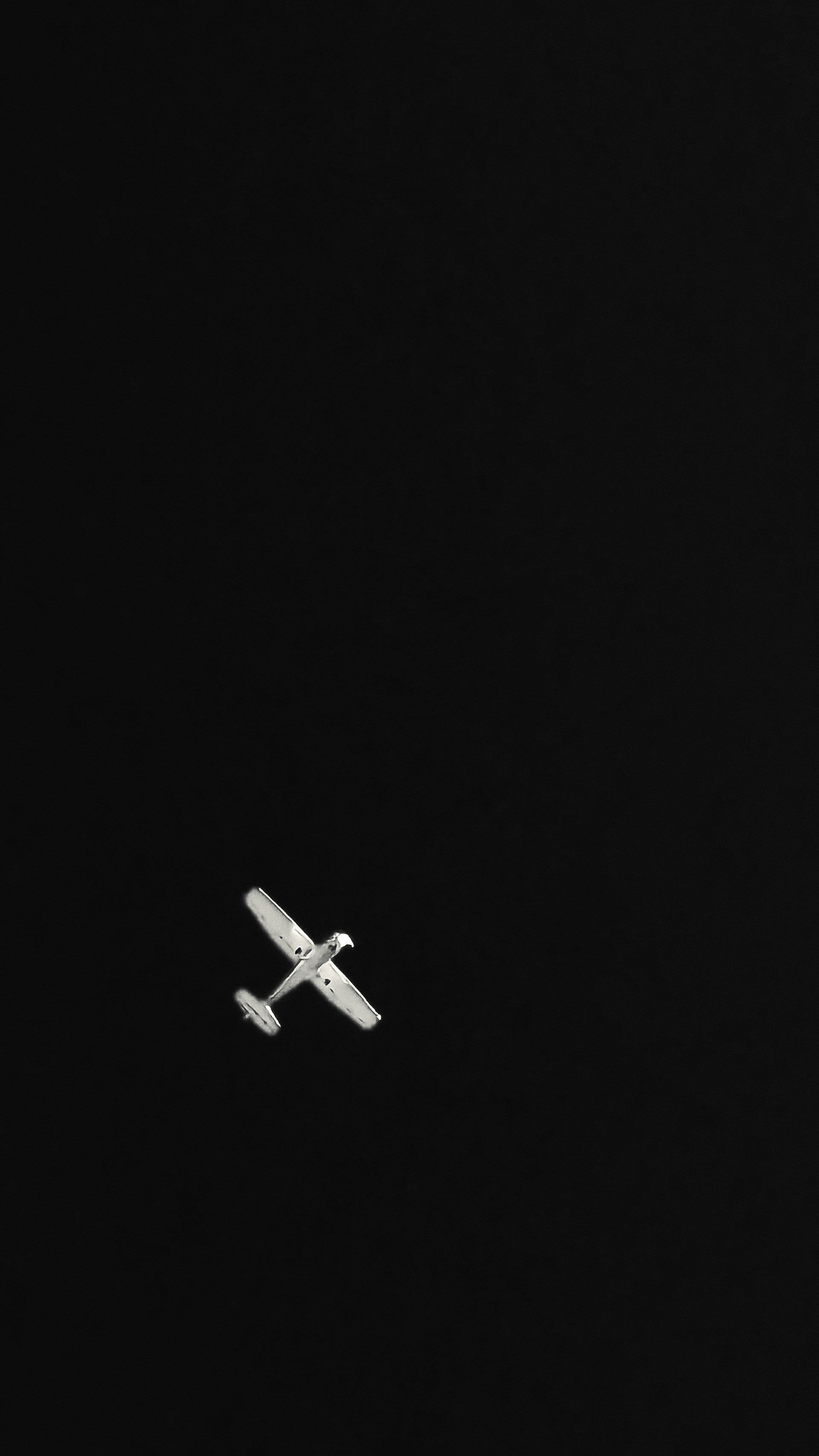 woman wearing yellow long-sleeved dress under white clouds and blue sky during daytime