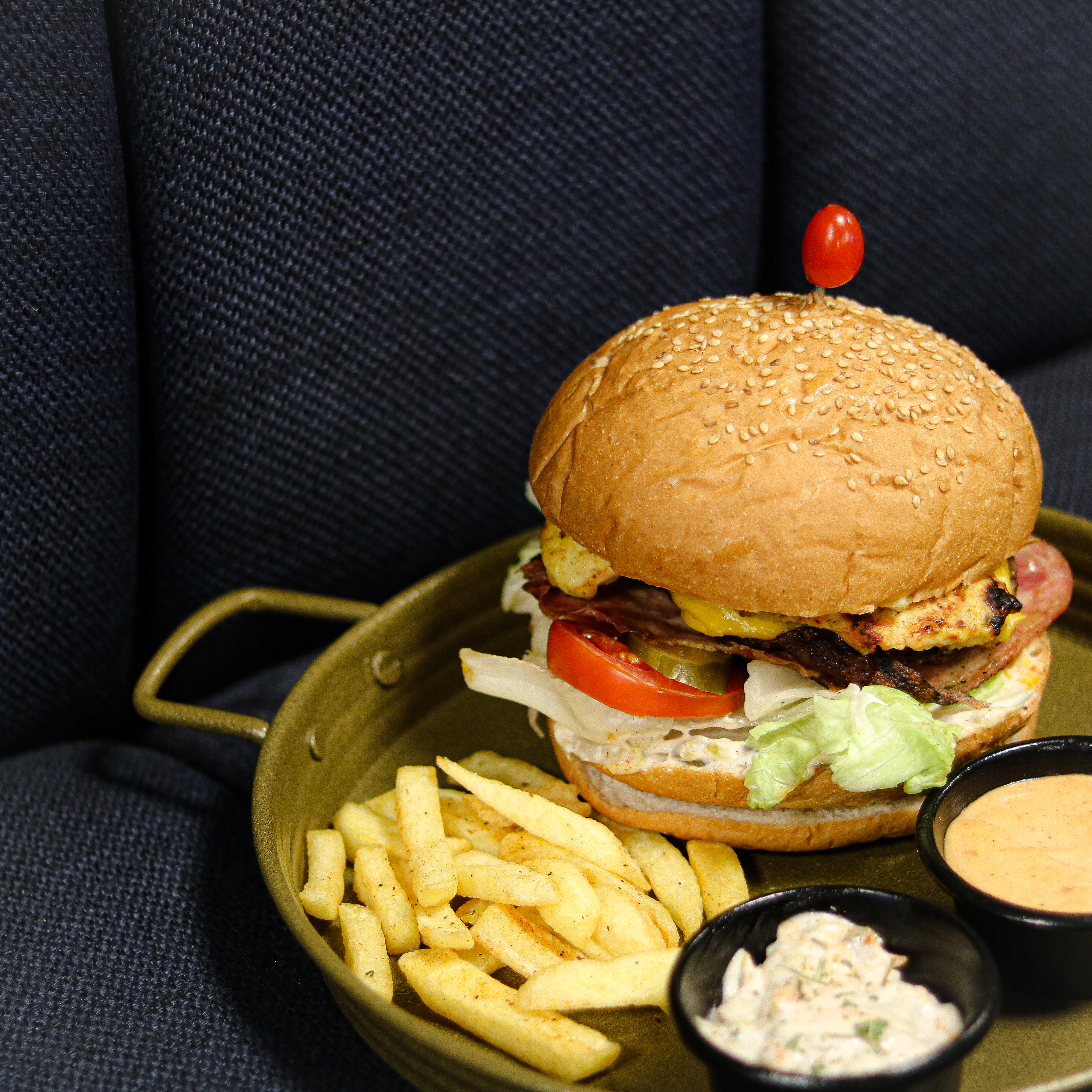 a plate with a hamburger and fries on it