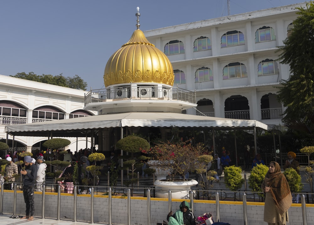 a large building with a golden dome on top of it