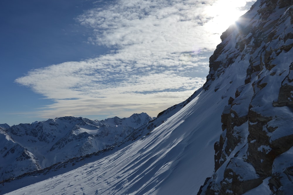 a person skiing down a snow covered mountain