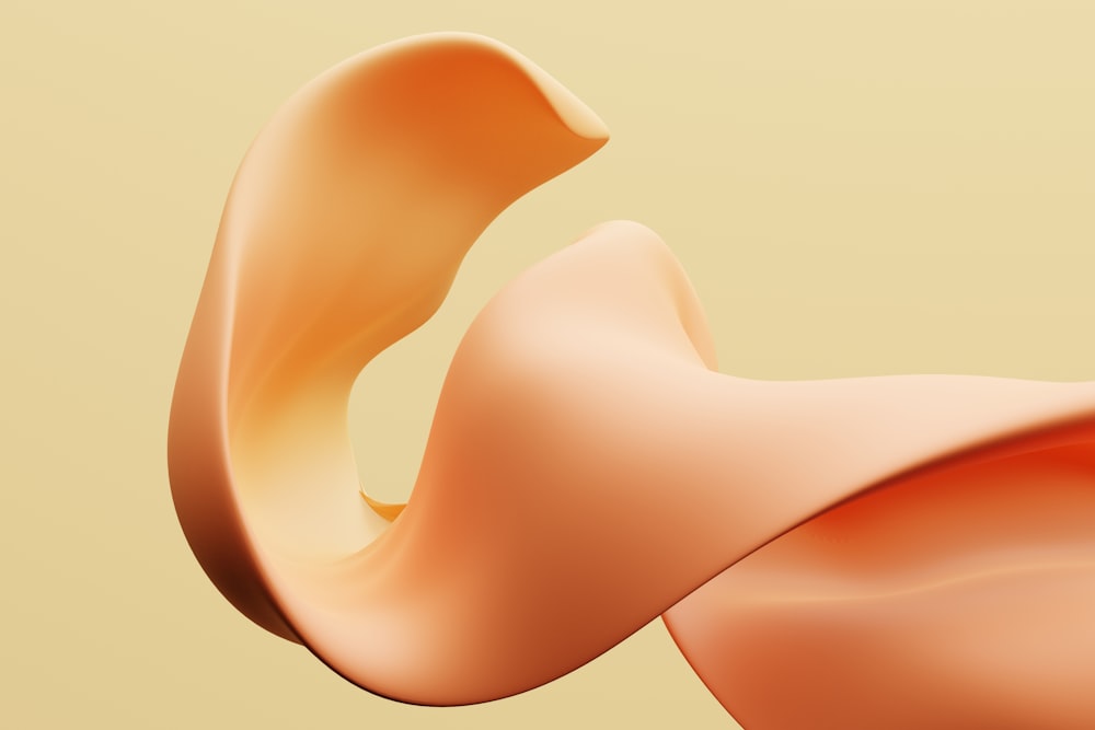a close up of a curved object on a yellow background