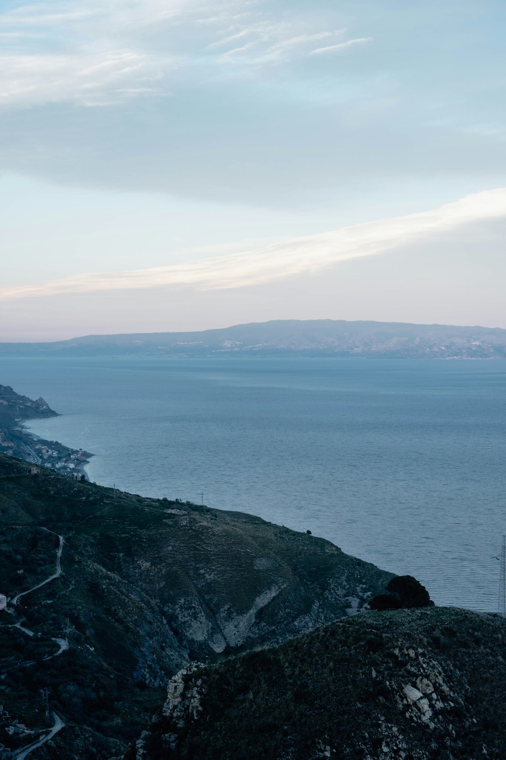 a view of a body of water from a hill