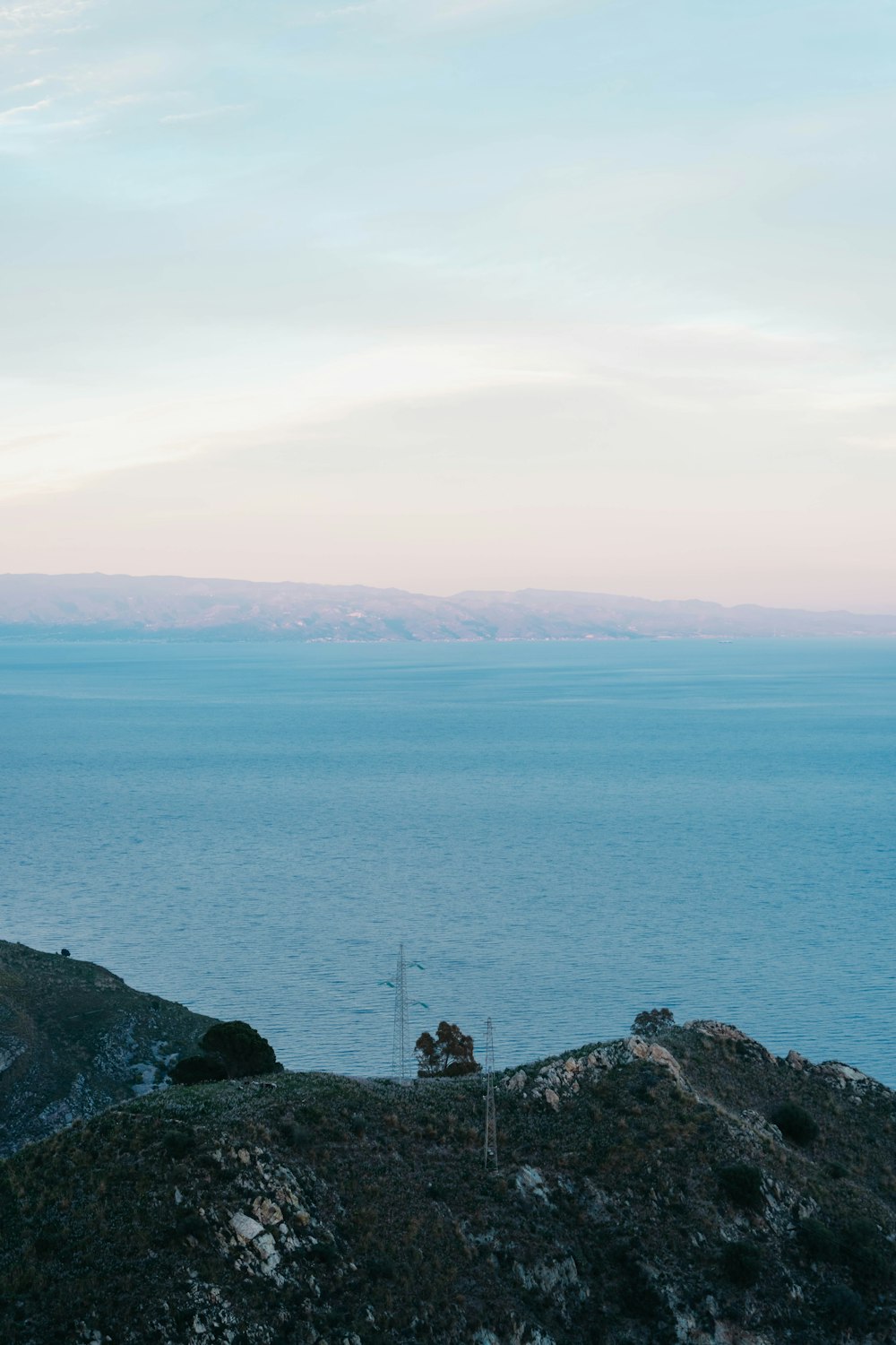 a view of a body of water from a hill