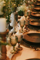 A dining table set with elegant casaviva tableware and simple decorative accents.