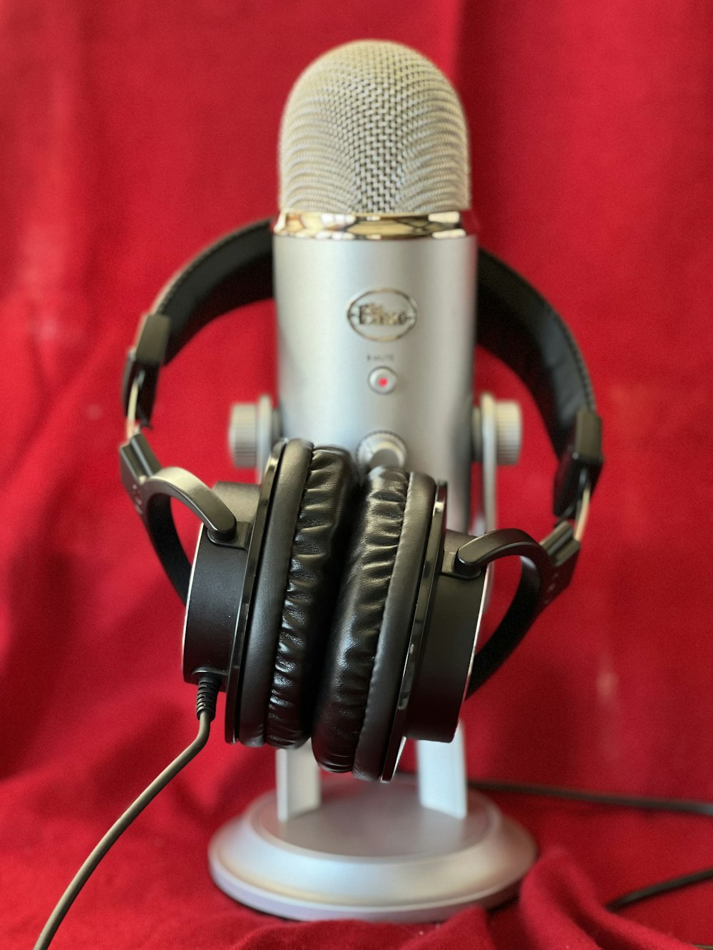 a microphone with headphones attached to it