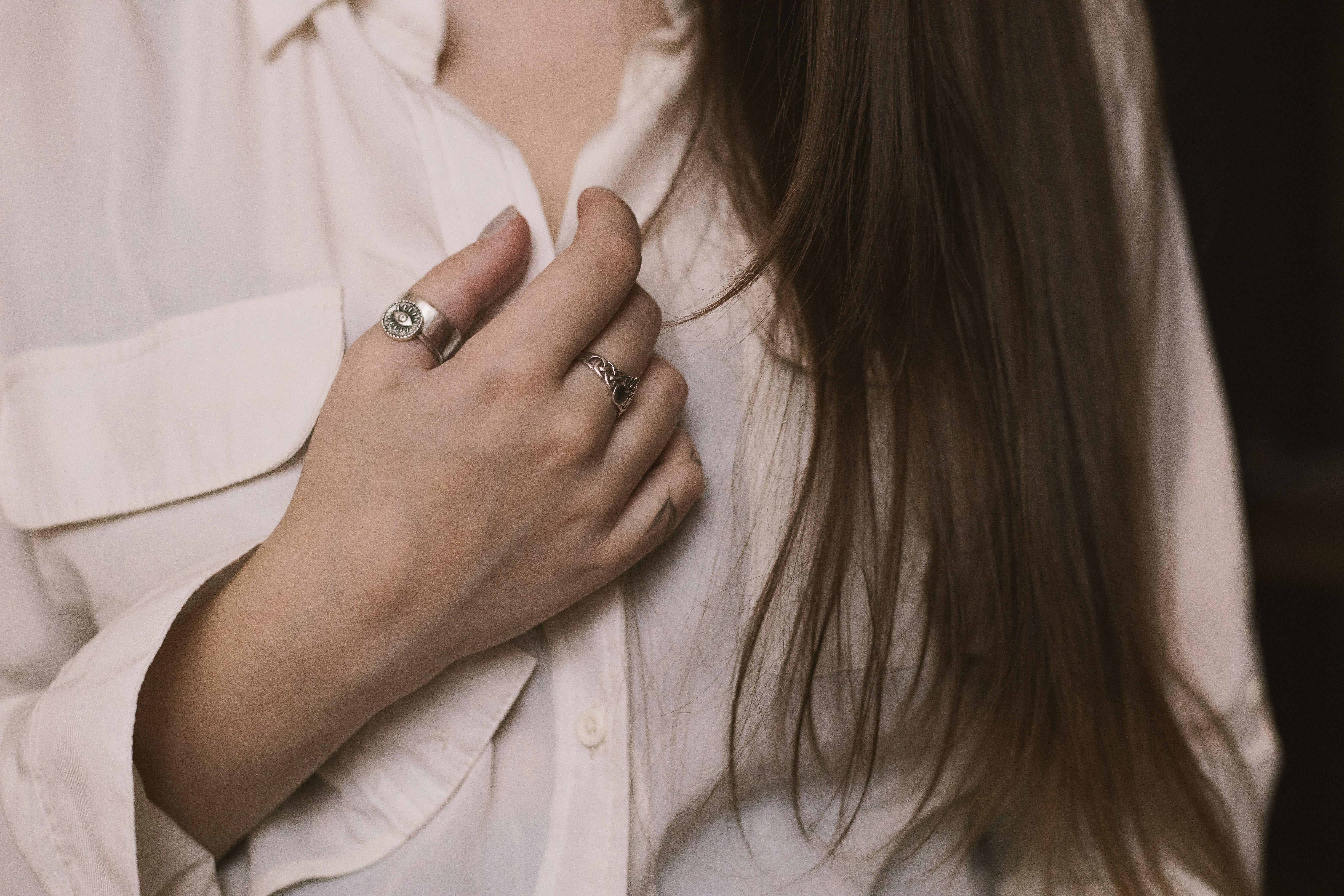 Elegant princess cut moissanite engagement ring on woman's hand
