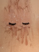 A close-up of luxurious strip eyelashes displayed elegantly.