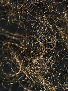 a close up of a cell phone with a bunch of wires on it