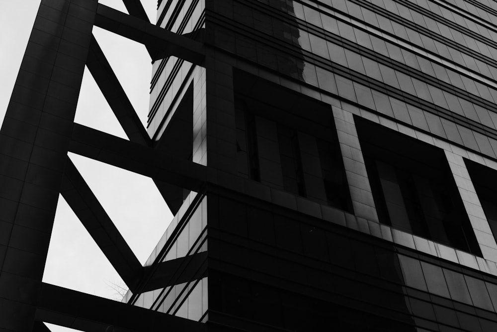 a black and white photo of a tall building