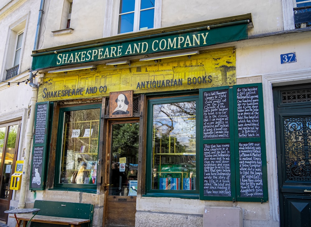 shakespeare and company store front with green and yellow awning