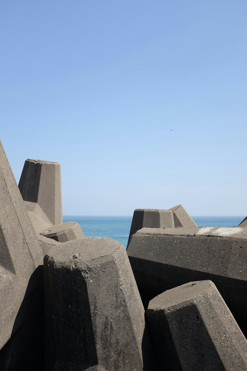 a close up of rocks near the ocean