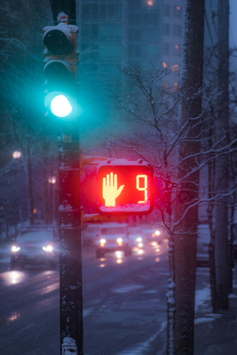 a traffic light with a red hand on it