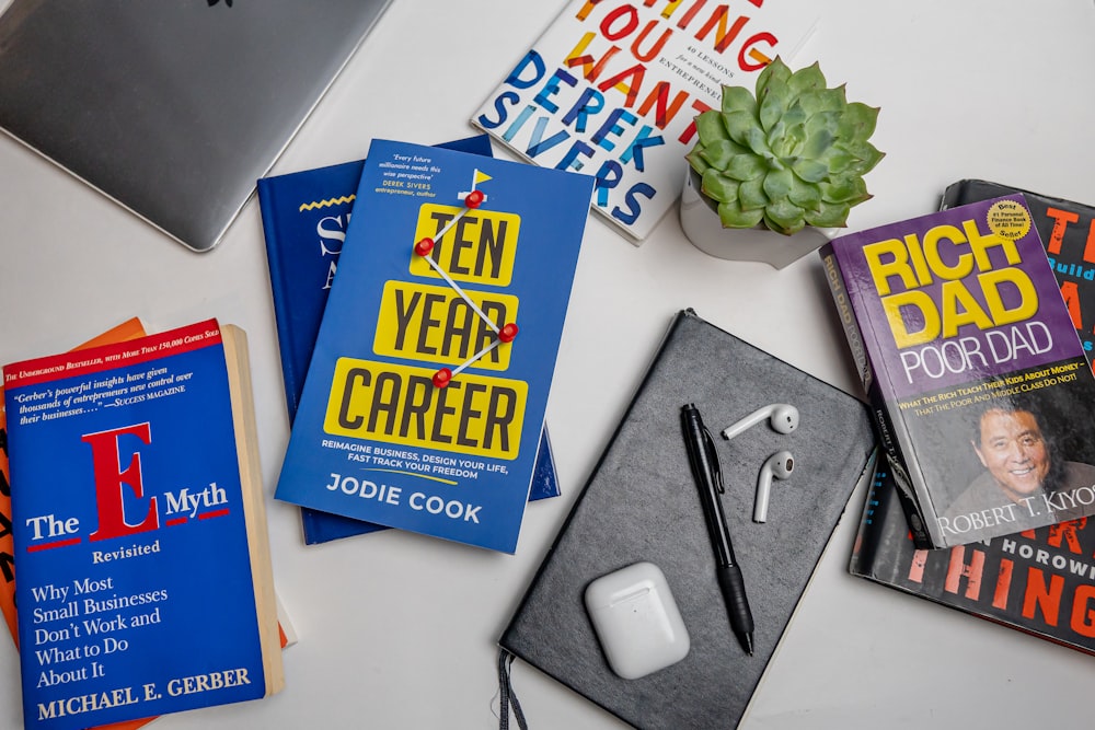 a bunch of books that are on a table