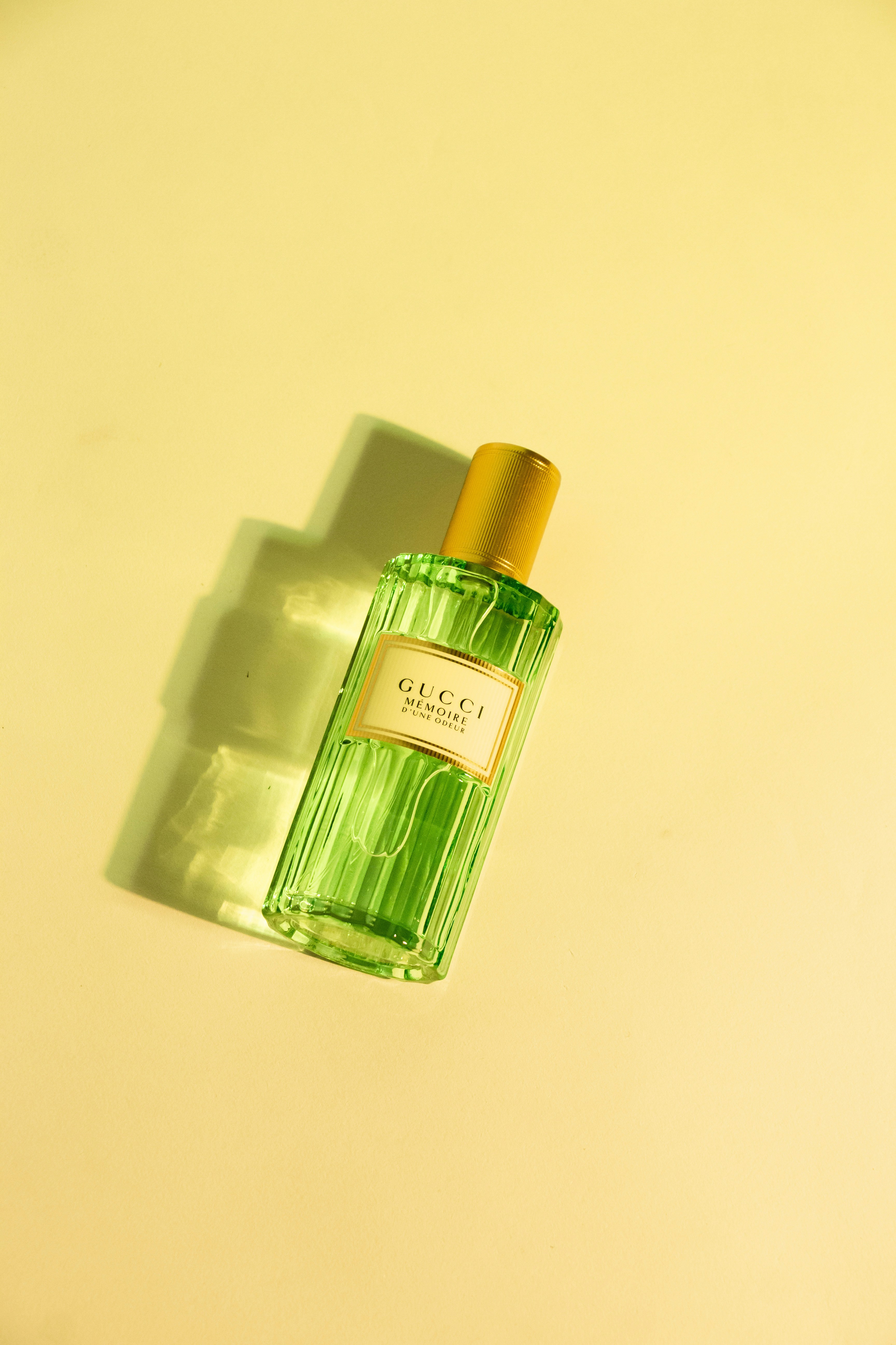 a bottle of perfume sitting on a table