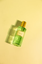 a bottle of perfume sitting on a table