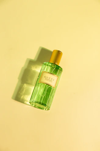 a bottle of perfume sitting on a table