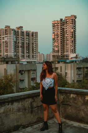 A sleek, modern outfit from accufinrtech displayed on a city rooftop at sunset.