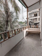 Completed balcony safety net installation overlooking a busy street in Navi Mumbai.