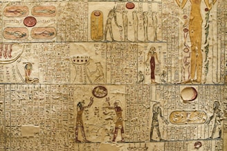 a wall with ancient egyptian writing on it