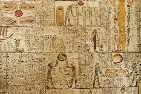 a wall with ancient egyptian writing on it