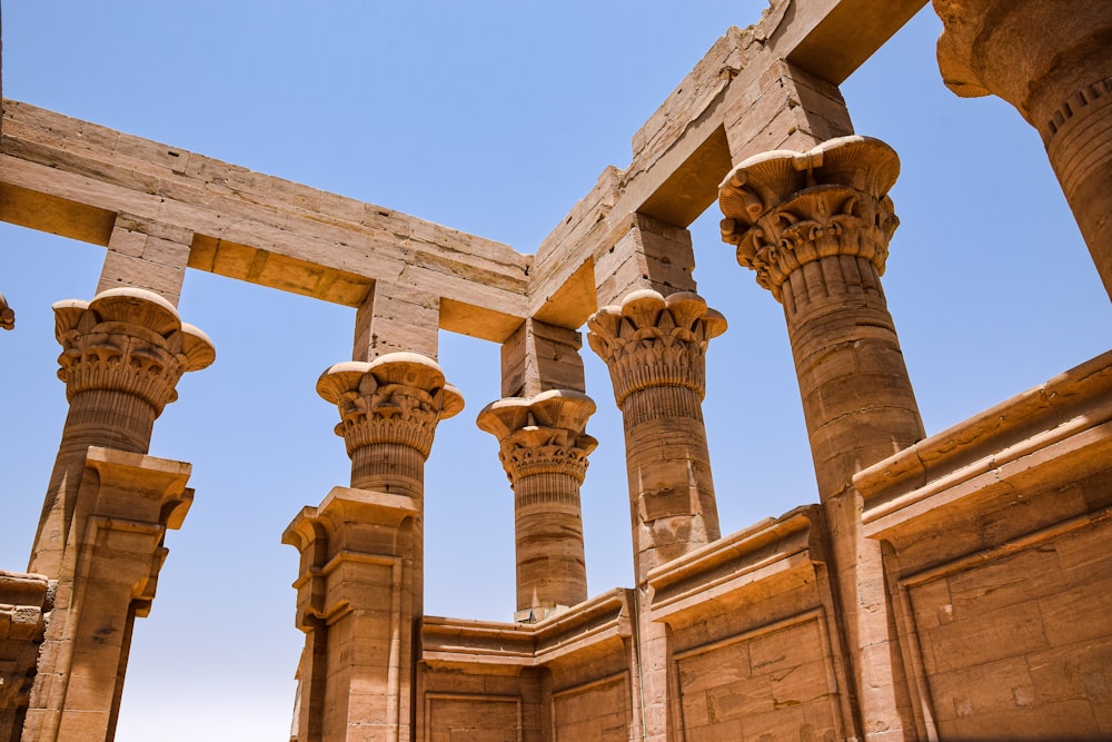 a group of stone pillars in a building